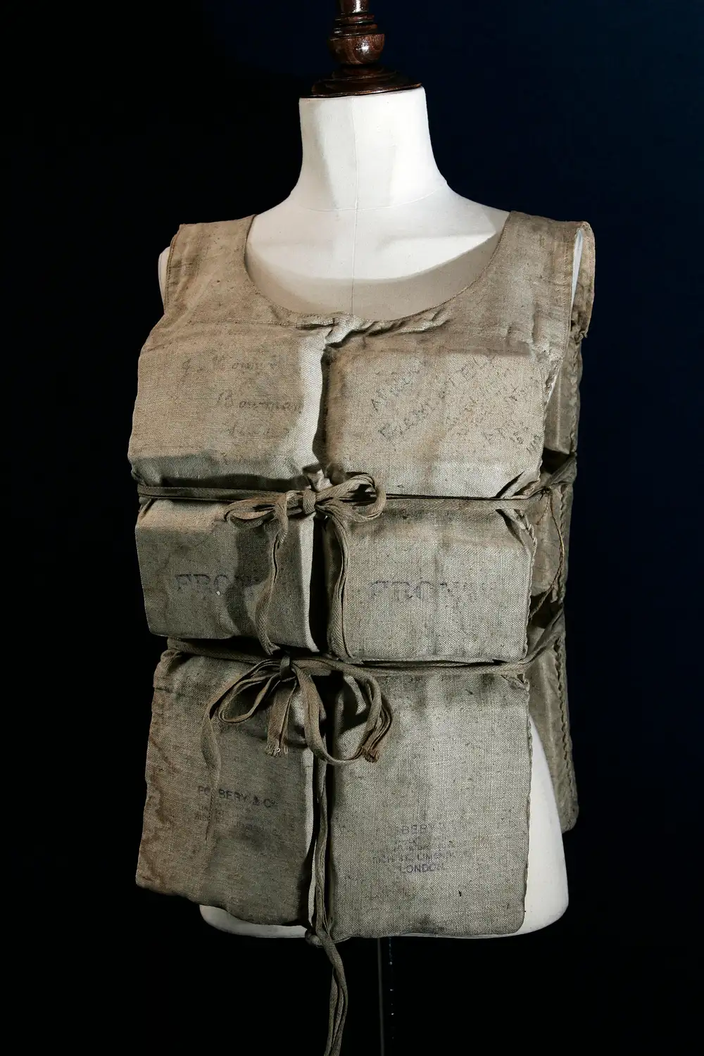 FILE - A Titanic life-preserver, belong to a survivor is shown, London, Wednesday, May 16, 2007. ((AP Photo/Sang Tan)