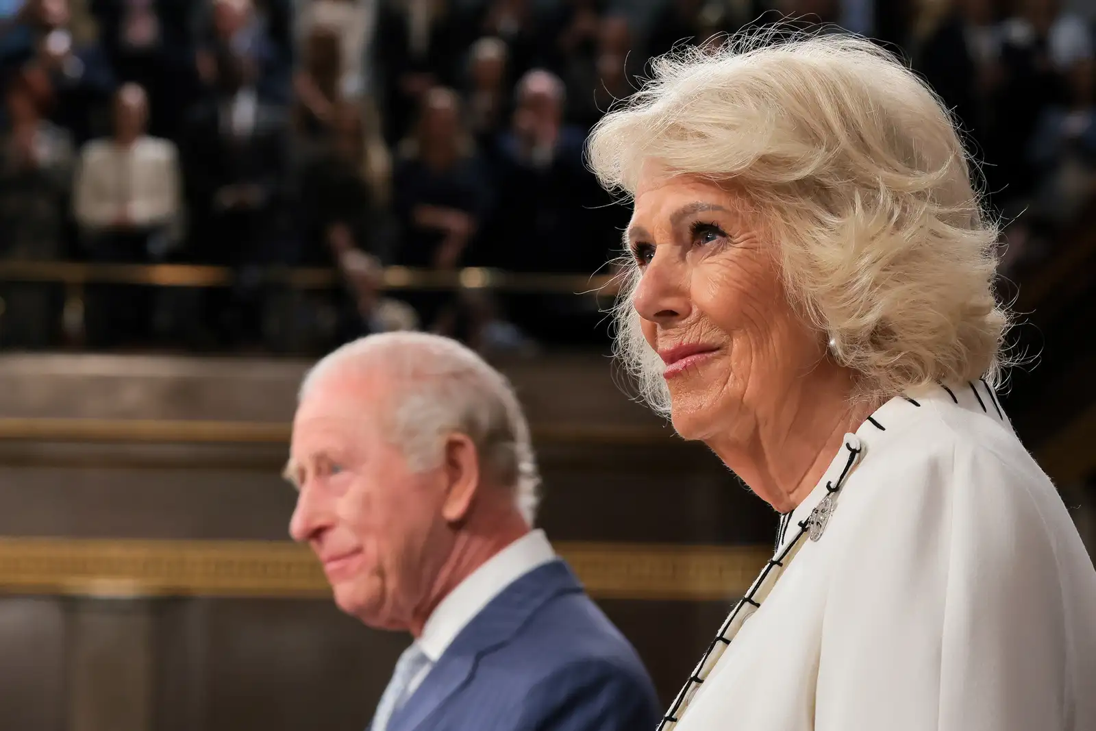 epa12920570 Queen Camilla (R) looks on next to Britain's King Charles III (L) as they arrive for a joint meeting of Congress in the House Chamber of the US Capitol in Washington, DC, USA, 28 April 2026. The British royal couple is on a four-day state visit to the US to mark the 250th anniversary of the Declaration of Independence.  EPA/KYLIE COOPER / POOL