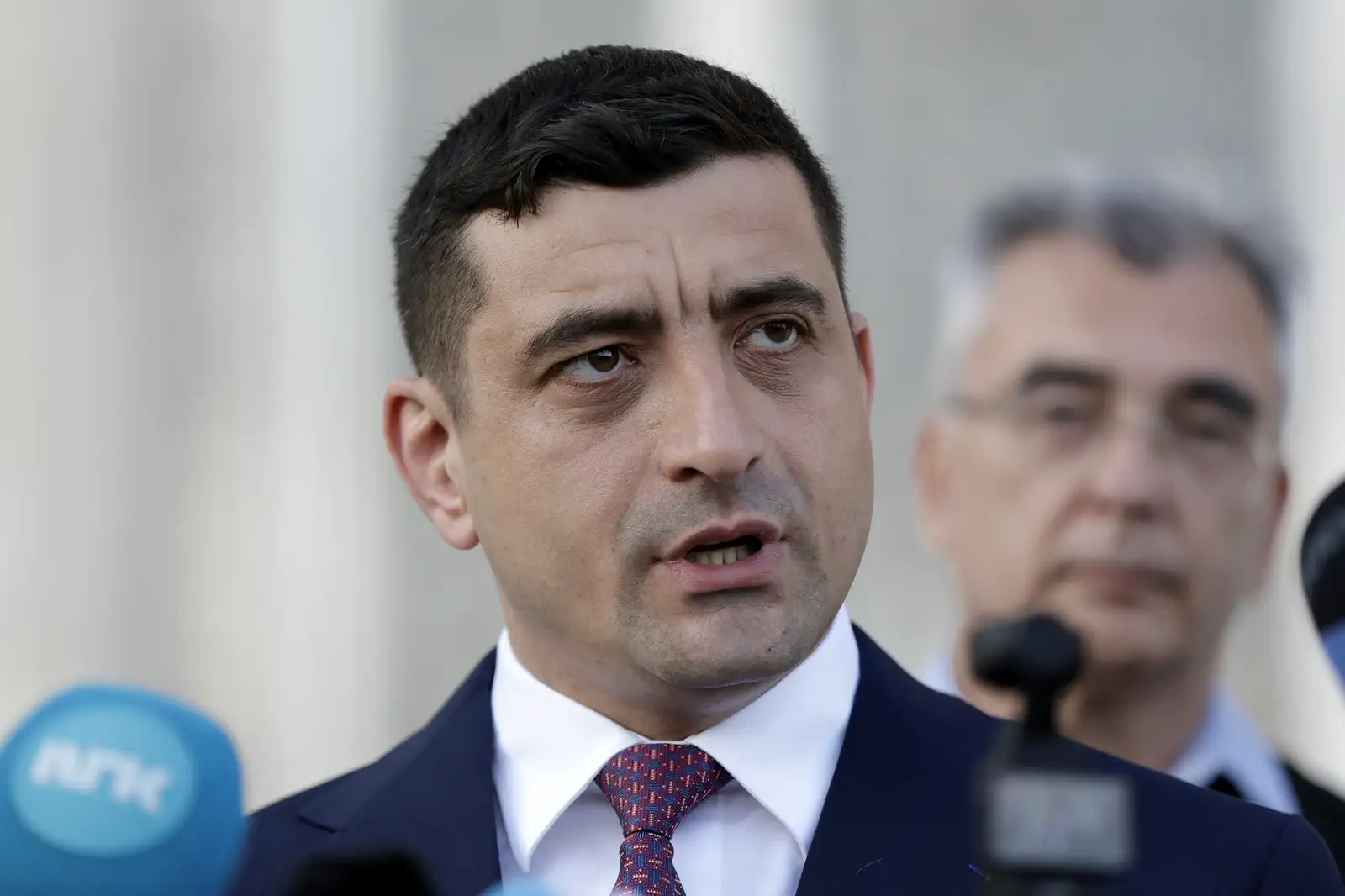 epa12073540 Ultra-nationalist party AUR leader George Simion speaks at a press conference with foreign media journalists held outside the Parliament Palace, on repeated presidential elections, first round, in Bucharest, Romania, 04 May 2025. Crin Antonescu is ranked second in the repeated presidential race. Approximately 18 million Romanian citizens are expected at the polling stations, according to the Permanent Electoral Authority (AEP).  EPA-EFE/ROBERT GHEMENT