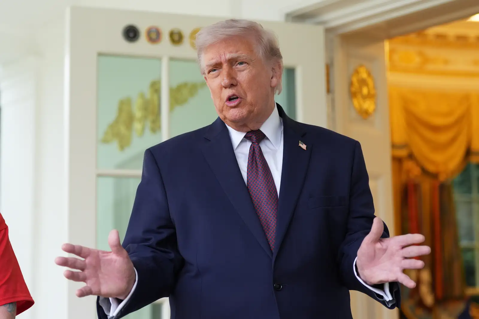 President Donald Trump speaks outside the Oval Office of the White House, Monday, April 13, 2026, in Washington. (AP Photo/Alex Brandon)