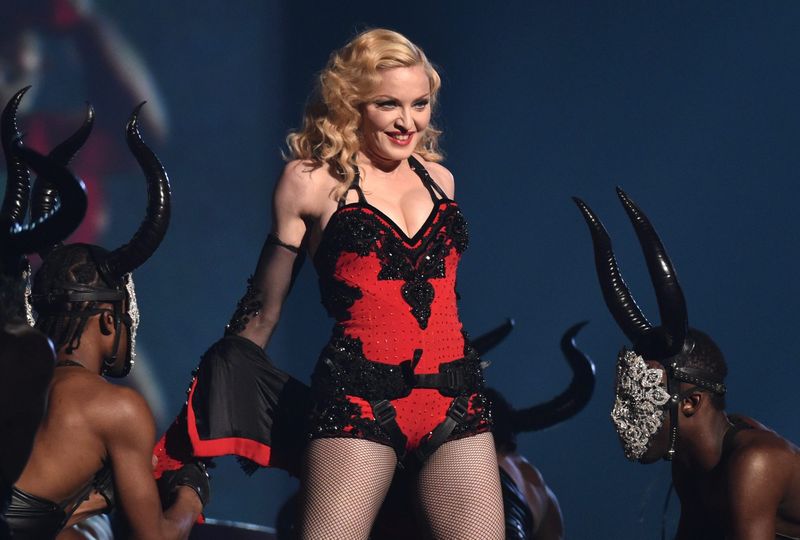 FILE - This Feb. 8, 2015 file photo shows Madonna performing at the 57th annual Grammy Awards in Los Angeles. Madonna, Rihanna and Sam Smith will perform at the second annual iHeartRadio Music Awards on March 29, 2015, at the Shrine Auditorium in Los