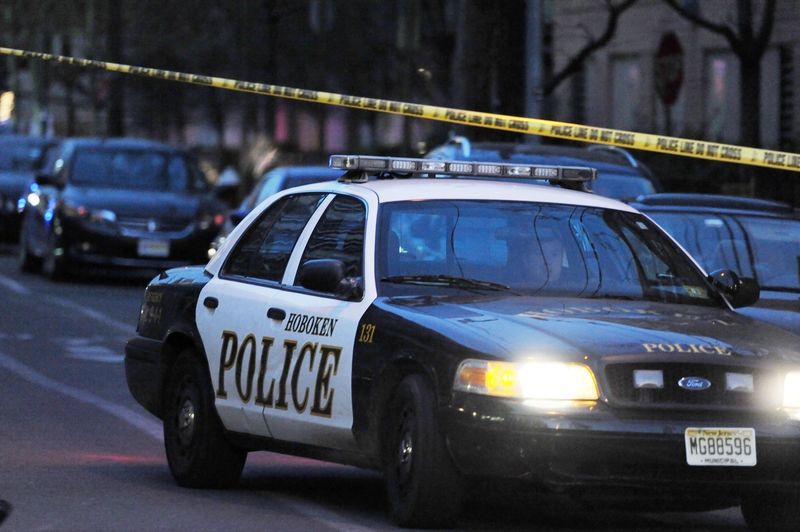 epa03509079 Hoboken Police occupy a crime scene believed to be related to the mass shooting at Sandy Hook Elementary School in Newtown, Connecticut in Hoboken New Jersey, USA, 14 December 2012.Multiple deaths were reported in a shooting at a US elementary school in Connecticut. Reports state that said 27 people were dead, including 14 children. President Barack Obama had been informed and was getting regular updates on the situation, the White House said. A person believed to be the shooter was among the dead, the Hartford Courant newspaper reported. The school principal and a school psychiatrist were also killed, media reports state.  EPA/PETER FOLEY