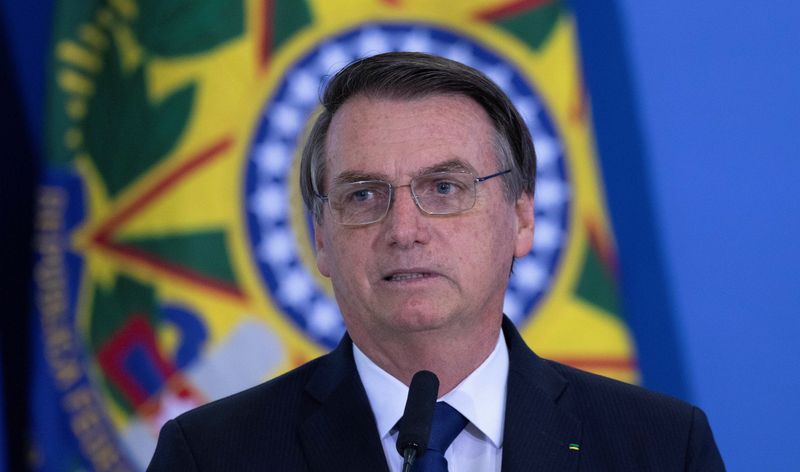 epa07613377 Brazilian President Jair Bolsonaro takes part in the signing of the National Policy of Regional Development Decree, in Brasilia, Brazil, 30 May 2019.  EPA-EFE/Joedson Alves