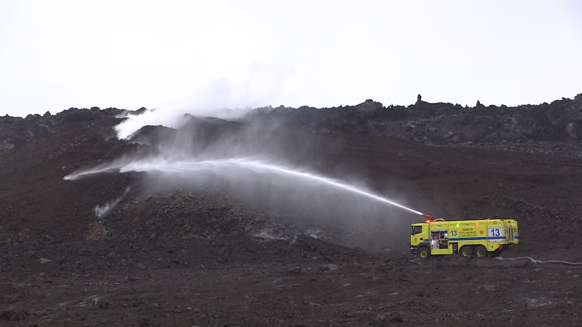 Water sprayed on the lava in order to prevent lava from flowing over the rampart at Sýlingarfell.