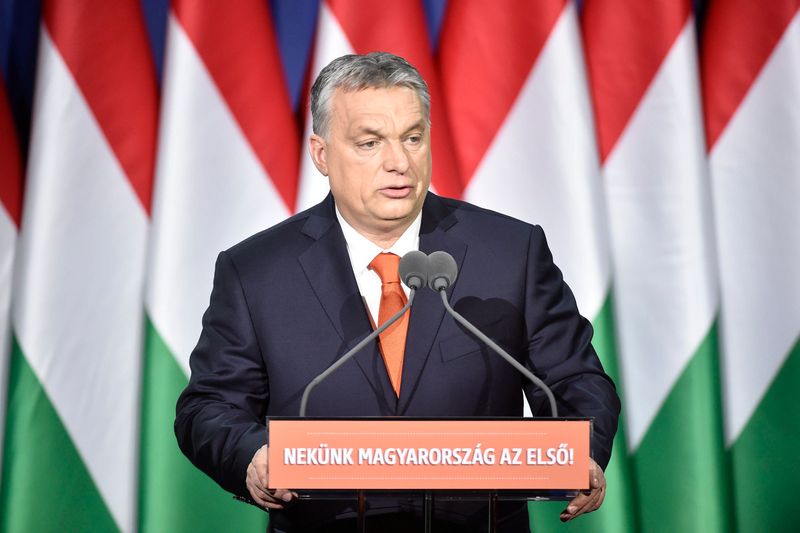 epa06539940 Hungarian Prime Minister Viktor Orban delivers his annual 'State of Hungary' speech in Budapest, Hungary, in Budapest, Hungary, 18 February 2018. The inscription reads: 'For us Hungary is first!'  EPA-EFE/Zoltan Mathe